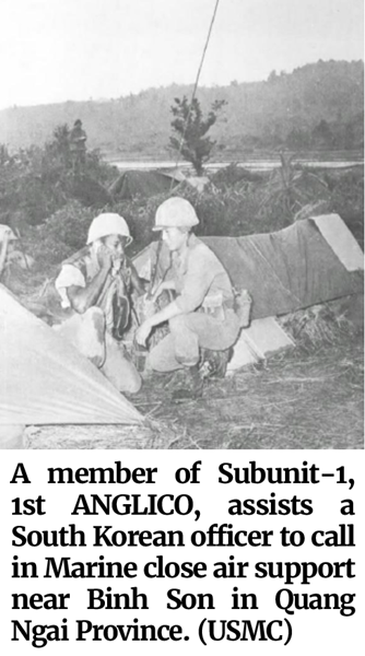Photo of a member of Subunit-1, 1st ANGLICO, assisting a South Korean officer to call in Marine close air support near Binh Son in Quang Ngai Province. (USMC)